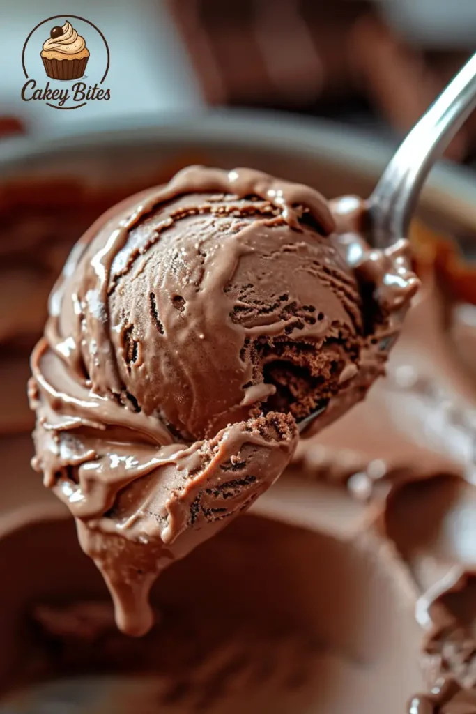 A spoonful of creamy brownie batter ice cream—capturing the rich texture and the joy of a first indulgent memory. A spoon dipped into rich, creamy brownie batter ice cream, capturing the indulgent texture and the emotional spark of the very first taste.